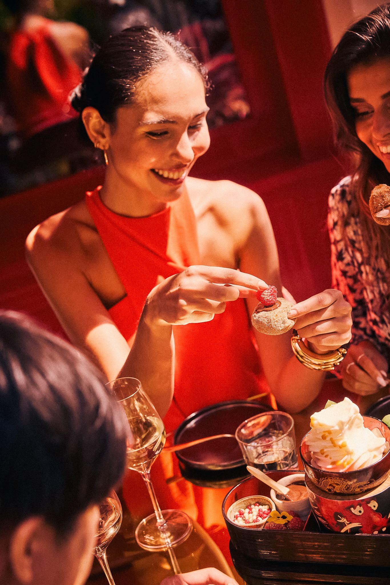 Friends having dinner at The Ivy Asia Leeds.