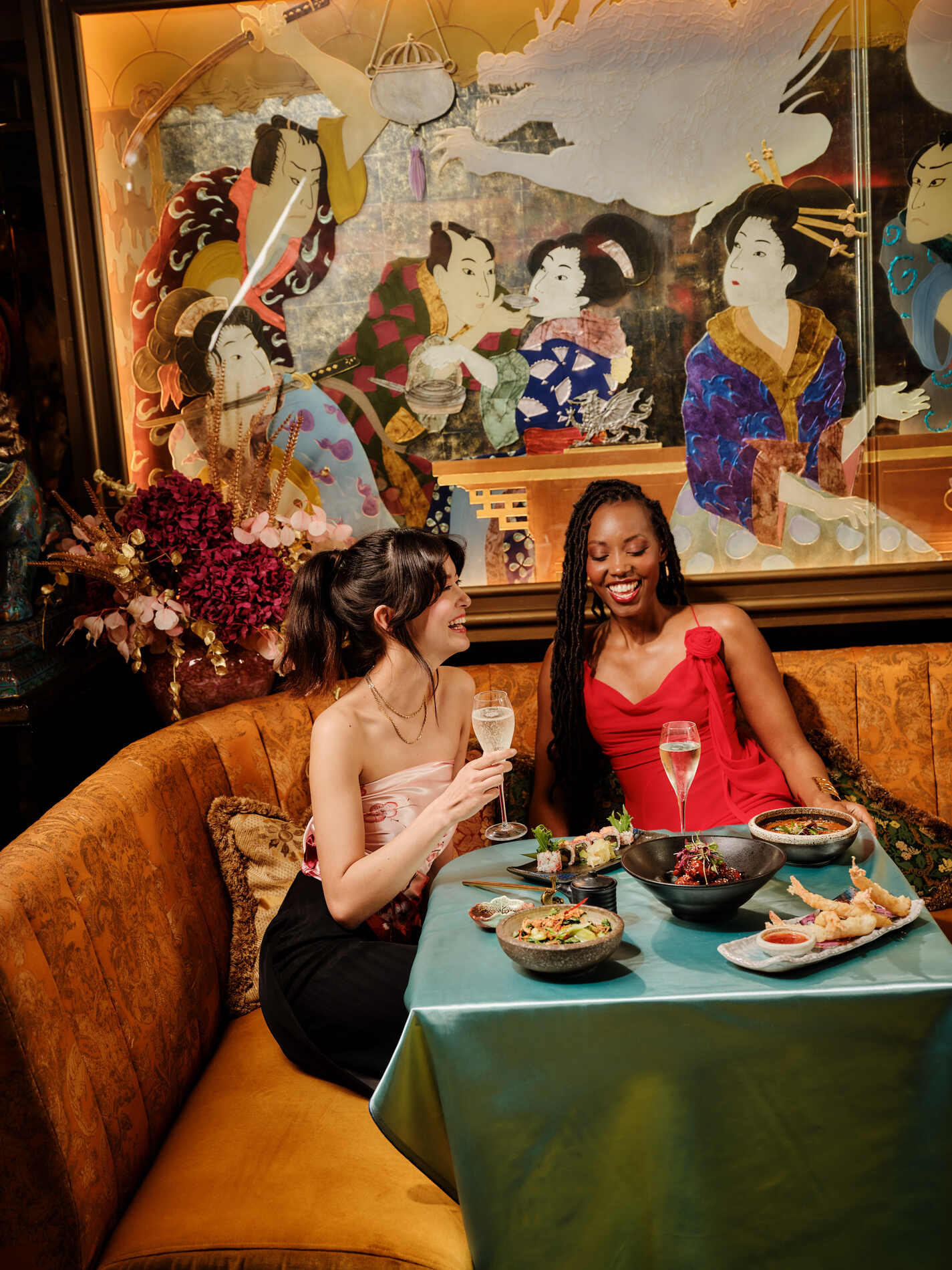 Friends having dinner and drinks at The Ivy Asia Guildford.