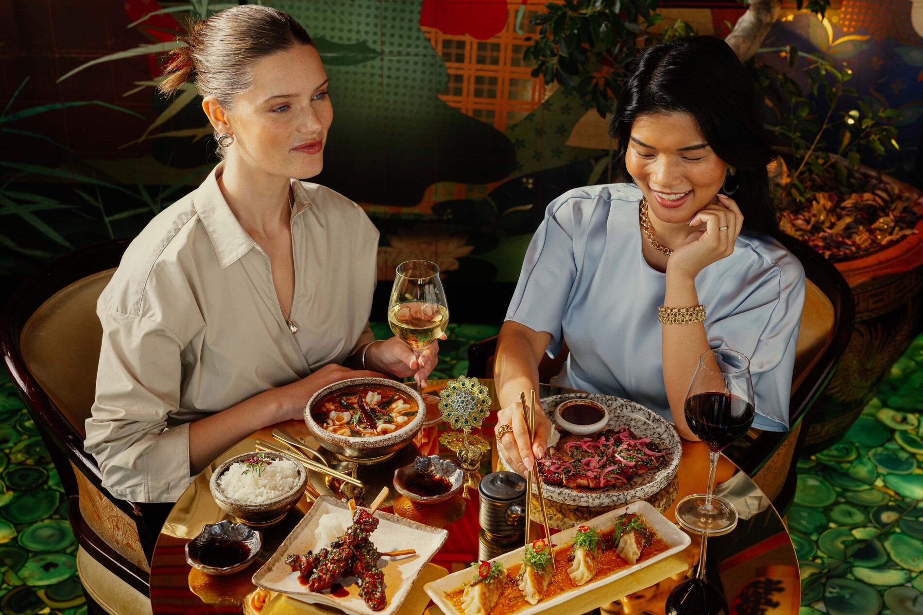 Friends having dinner at The Ivy Asia.