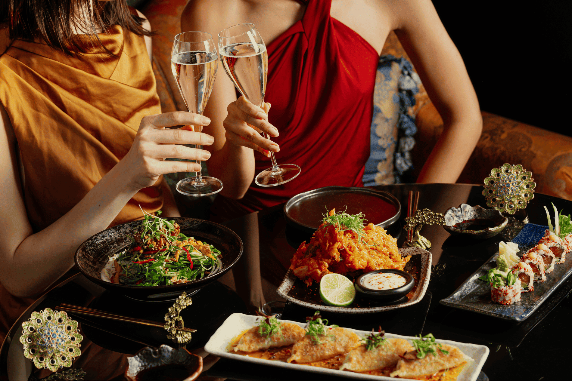 Friends having dinner and Champagne at THe Ivy Asia Cardiff.